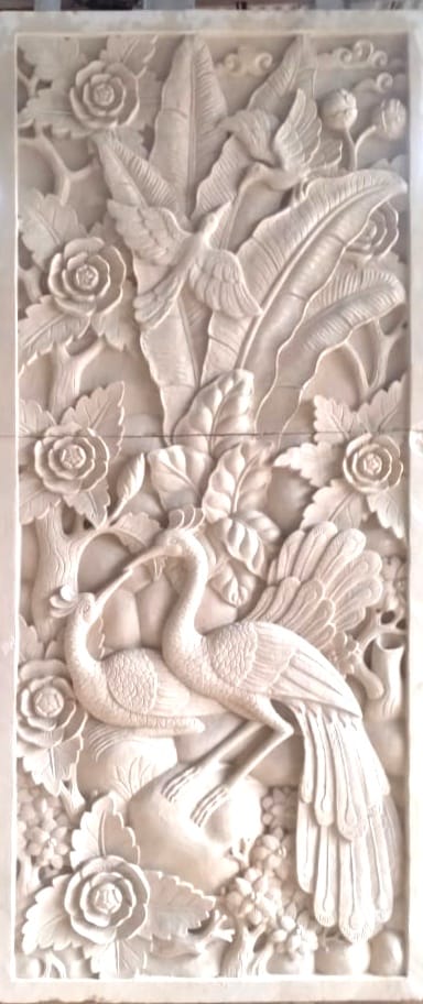 Relief Motif Burung Merak dan Flora